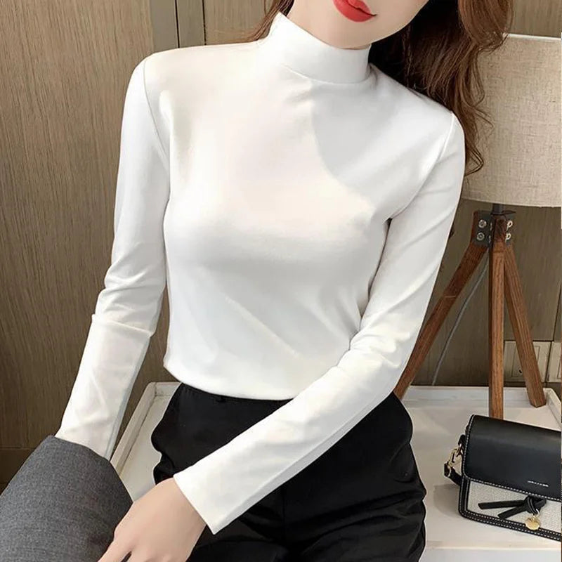 Comfortable plain top with a mid-rise neckline and long sleeves for women